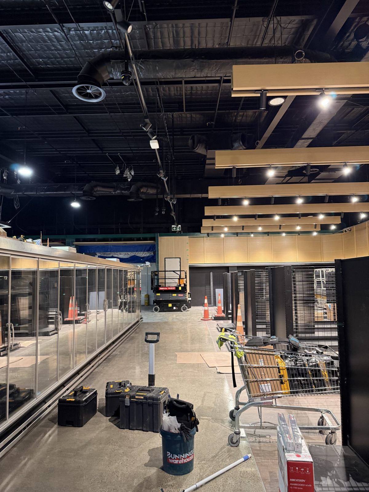 Supermarket fit-out with ceiling services and CCTV coverage planning