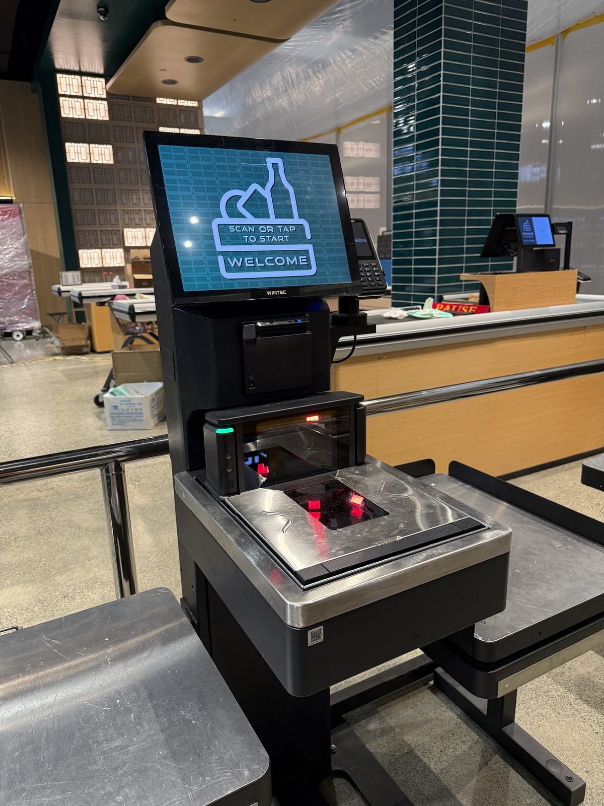 Self checkout POS station with scanner and customer display